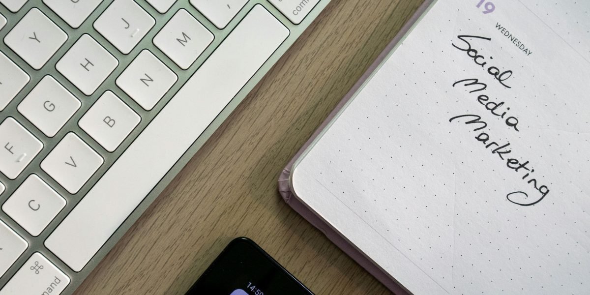 An individual focused on organizing a comprehensive social media content plan, highlighting the need for efficient tools.
