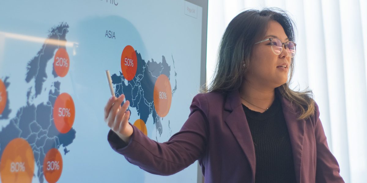 A professional presenting data analysis, possibly about public sentiment or media's impact on opinion.