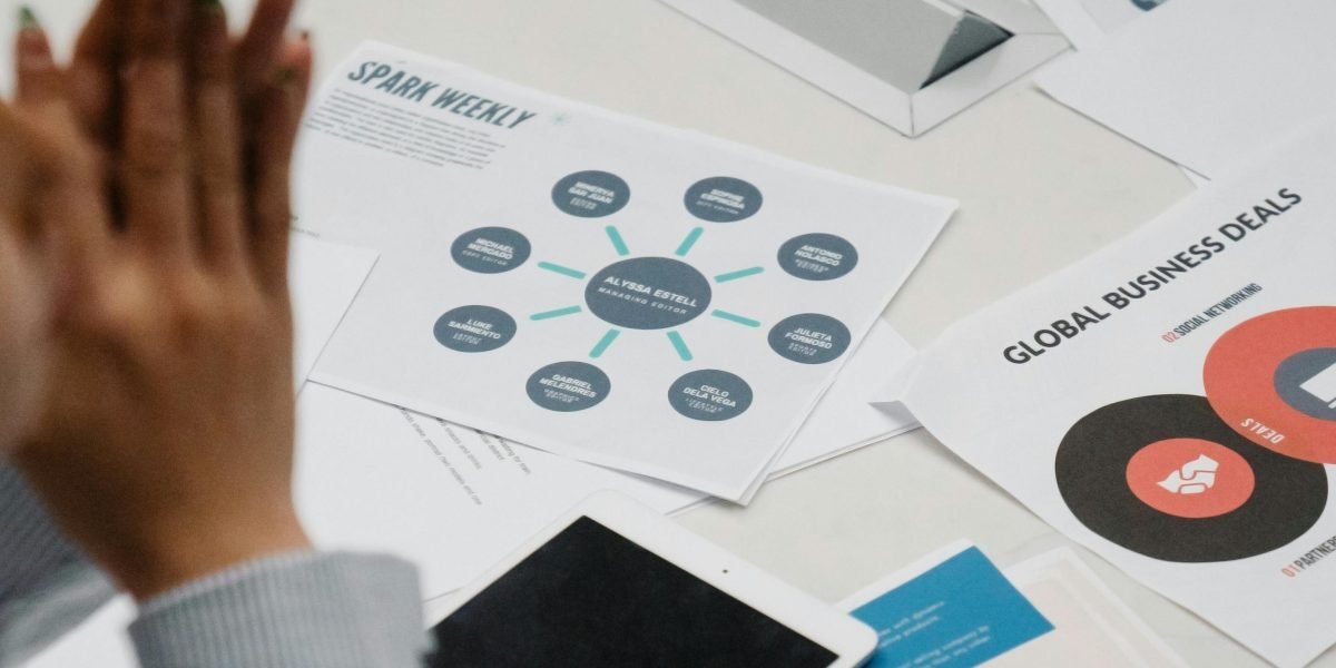 A business owner thoughtfully evaluates options to make informed media decisions for advertising or PR.