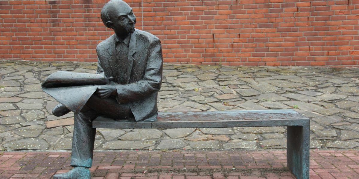 A person thoughtfully evaluating information, symbolizing the need for data-backed media decisions.