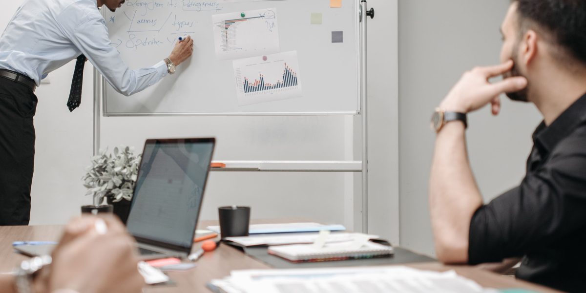 A marketing team collaborates, moving beyond gut instinct to data-driven media strategy.