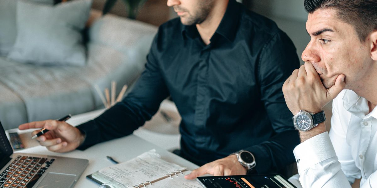 Professionals making data-driven decisions, reflecting the shift from gut feelings to measurable facts in ad placement.