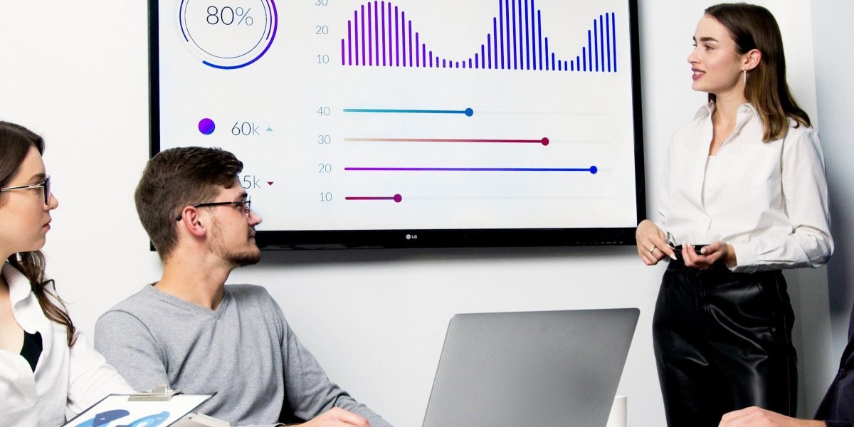A diverse team collaborates on a digital marketing strategy, emphasizing transparency and ethical practices.