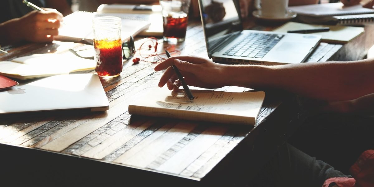 Stock photo showing a PR professional preparing localized pitches for francophone outlets.