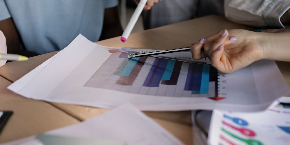 A marketing team collaborating and strategizing, aligning campaign goals with data-driven insights.