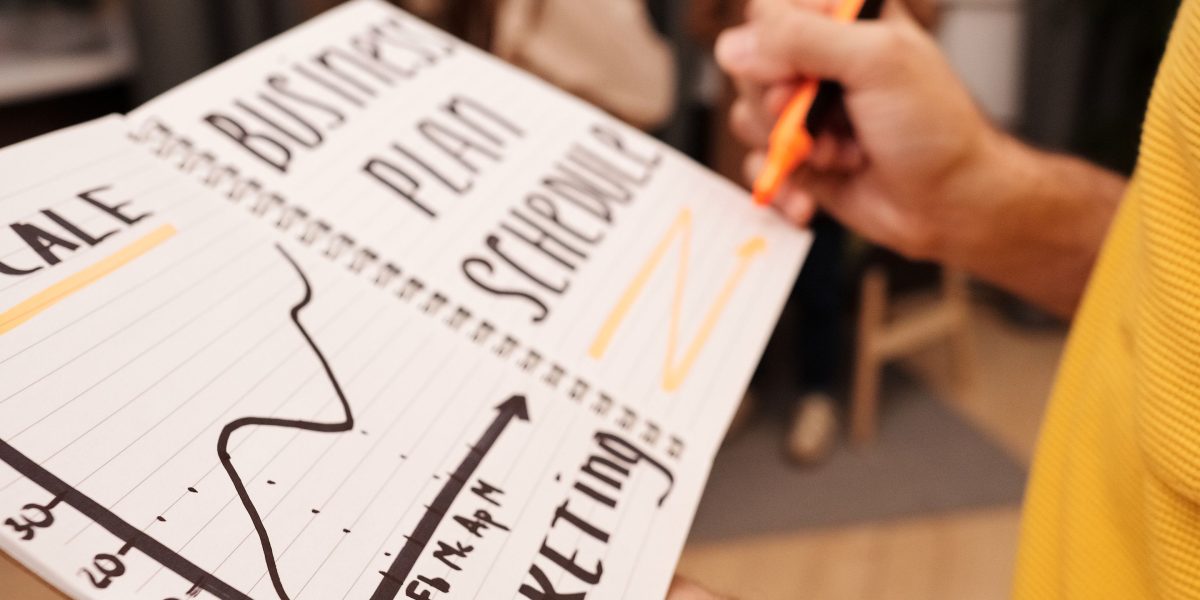 A marketing team collaborating on a strategy, symbolizing the integration of print and digital media campaigns.