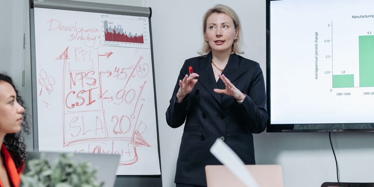 A professional confidently presenting or explaining complex data, embodying competence and trustworthiness.