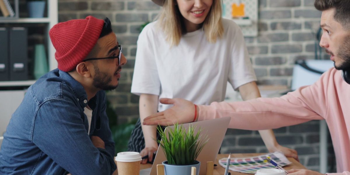 Professionals collaborating to ensure brand safety and credibility in ad placements.